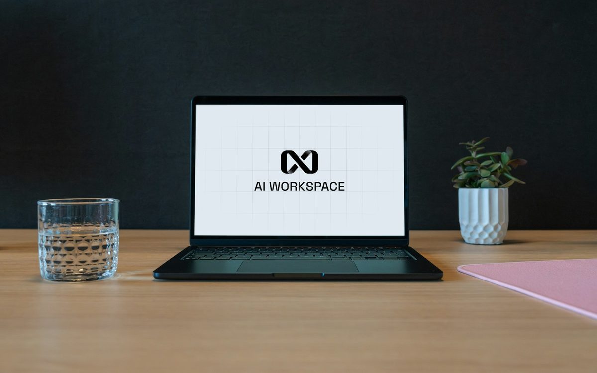 Laptop with ai workspace logo on screen